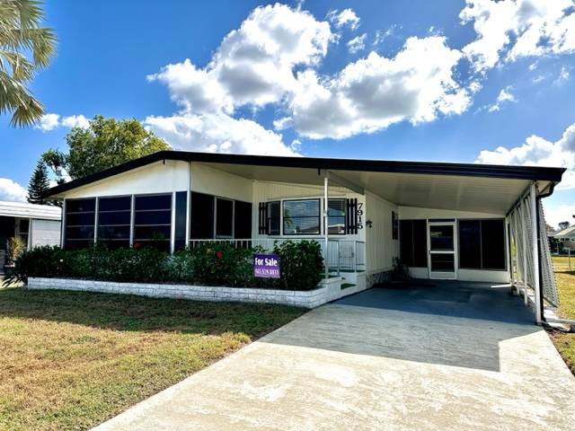Ellenton, FL Mobile Home for Sale located at 7915 Lakeshore Dr Colony Cove