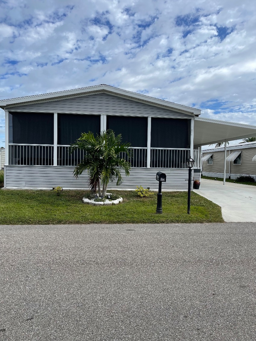 North Fort Myers, FL Mobile Home for Sale located at 14720 Pioneer Place Old Bridge Village