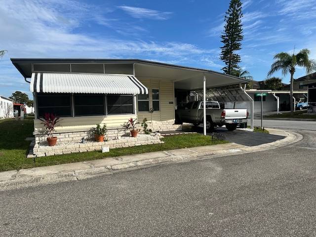Clearwater, FL Mobile Home for Sale located at 15666 49th St N #1143 Shady Lane Village