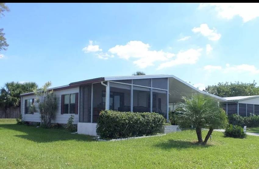 Sarasota, FL Mobile Home for Sale located at 5711 Camelford Drive Camelot Lakes