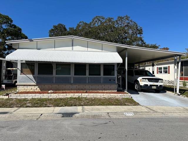 Clearwater, FL Mobile Home for Sale located at 15666 49th St N #1021 Shady Lane Village