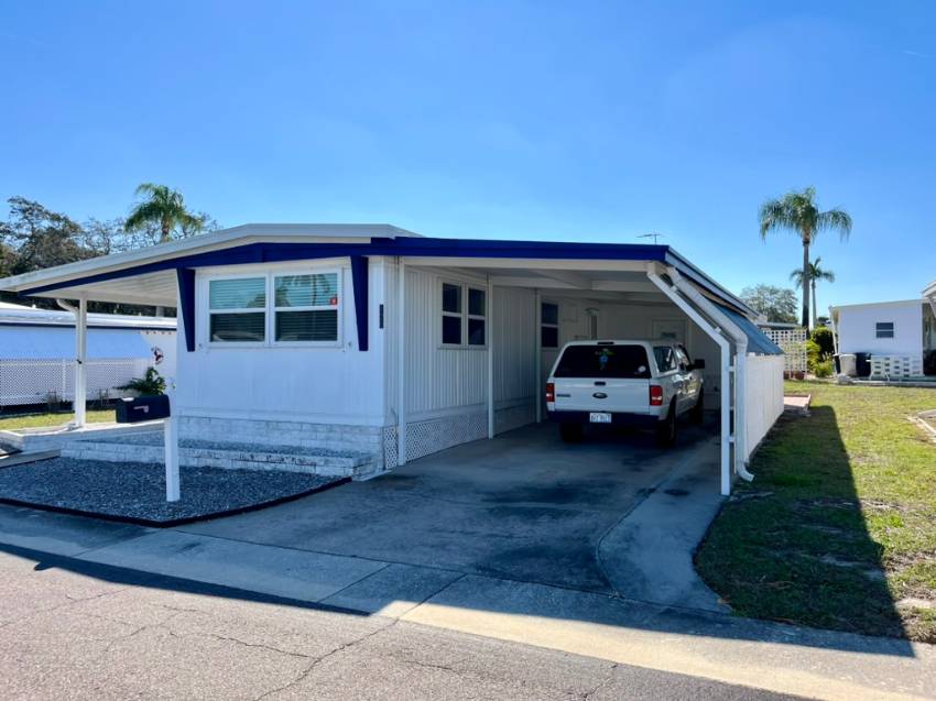 Dunedin, FL Mobile Home for Sale located at 1100 Curlew Rd Lot 128 Frontier Village