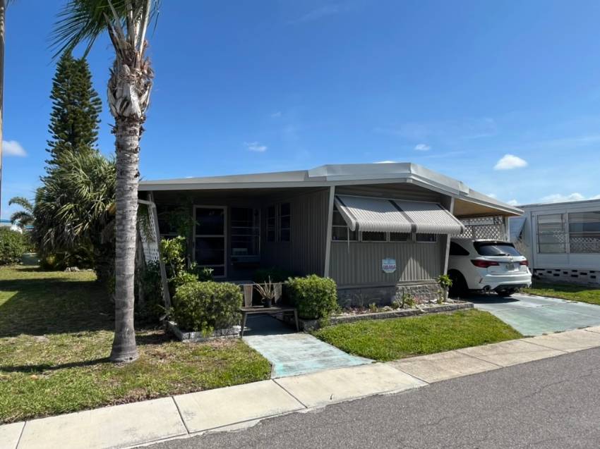 Dunedin, FL Mobile Home for Sale located at 1415 Main St Lot 450 Lake Haven