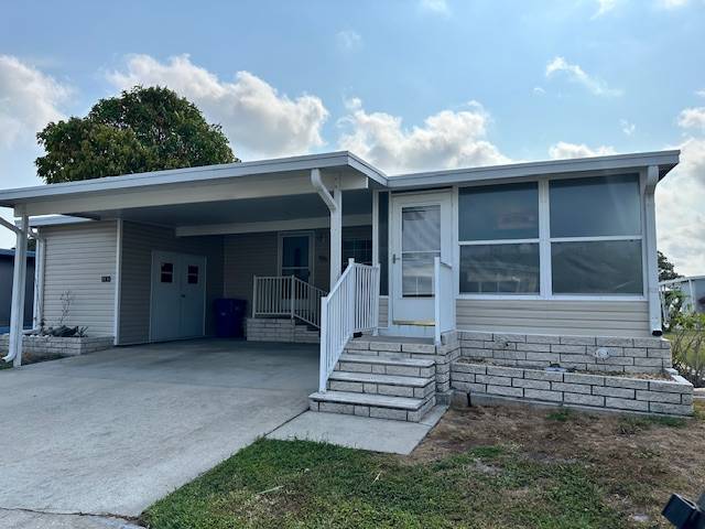 Clearwater, FL Mobile Home for Sale located at 15666 49th St N #1130 Shady Lane Village