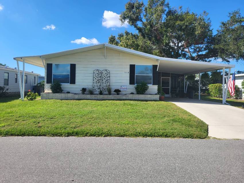 Sarasota, FL Mobile Home for Sale located at 5314 Sudbury Place Camelot Lakes Village