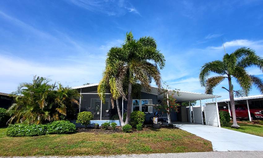 Sarasota, FL Mobile Home for Sale located at 5664 Halifax Dr Camelot Lakes Village