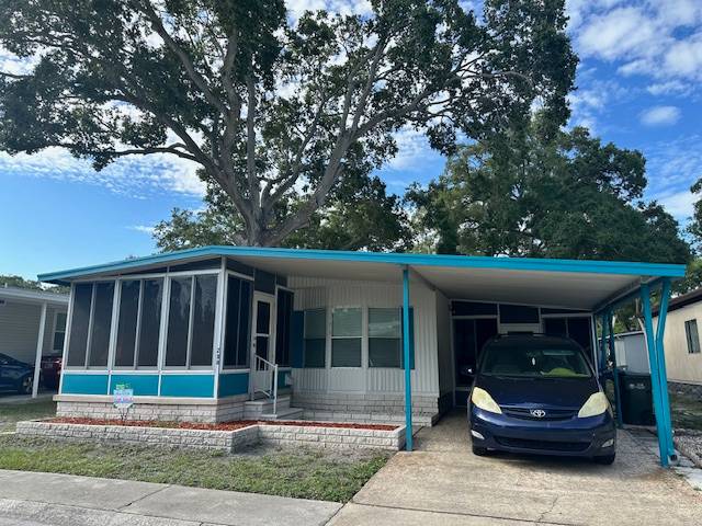 Clearwater, FL Mobile Home for Sale located at 15777 Bolesta Road #208 Shady Lane Village
