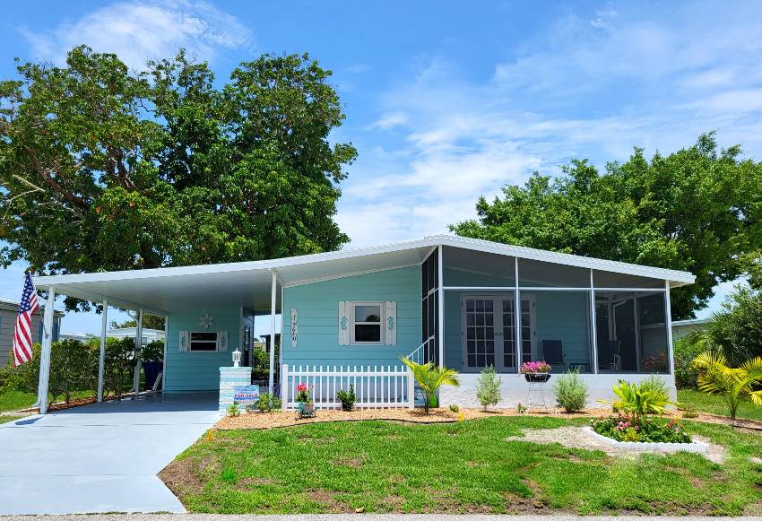 Sarasota, FL Mobile Home for Sale located at 5640 Halifax Drive Camelot Lakes Village