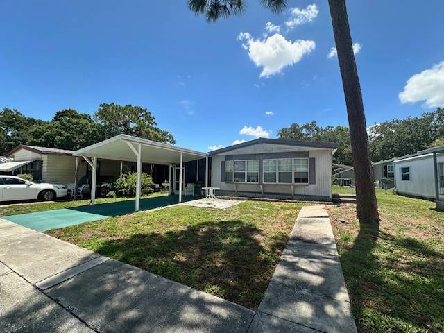 Clearwater, FL Mobile Home for Sale located at 15777 Bolesta Road #112 Shady Lane Oaks