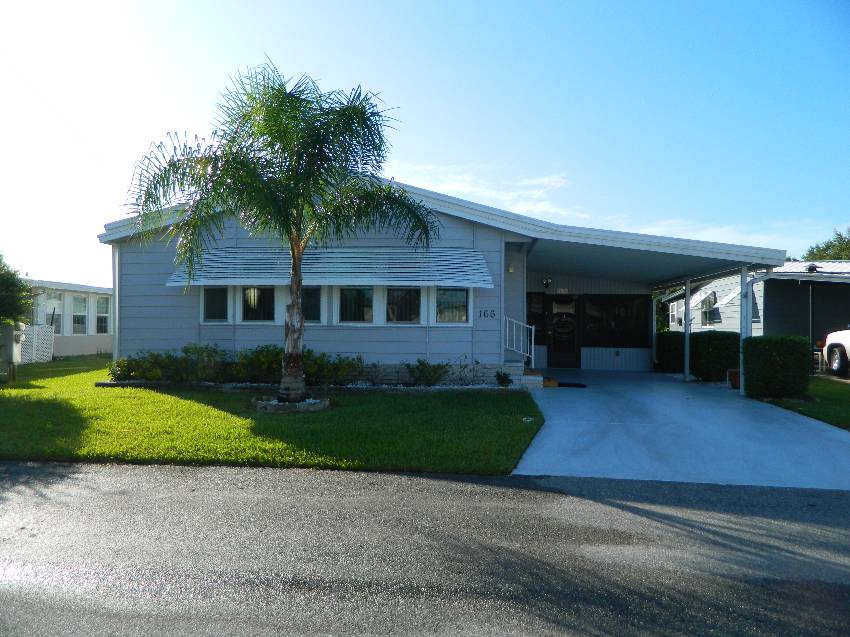 Lakeland, FL Mobile Home for Sale located at 2425 Harden Blvd #166 Beacon Terrace