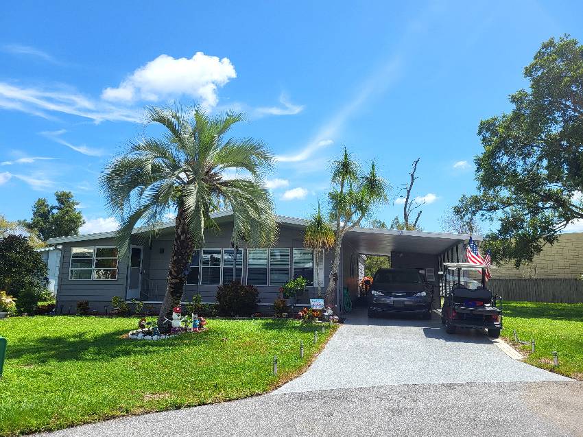 Sarasota, FL Mobile Home for Sale located at 5539 Camelford Terr Camelot Lakes Village