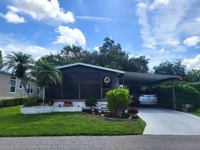 Sarasota, FL Mobile Home for Sale located at 5349 Sudbury Place Camelot Lakes Village