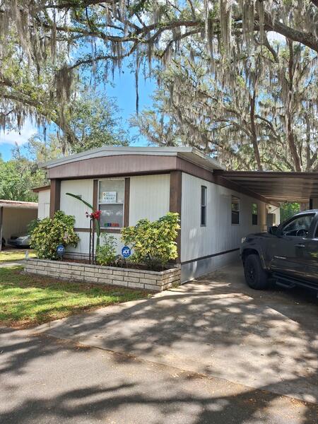 Zephyrhills, FL Mobile Home for Sale located at 5542 Eugene Street Sixth Avenue Mobile Home Community