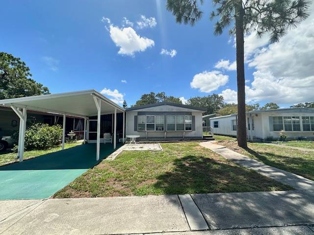 Clearwater, FL Mobile Home for Sale located at 15777 Bolesta Road #112 Shady Lane Oaks