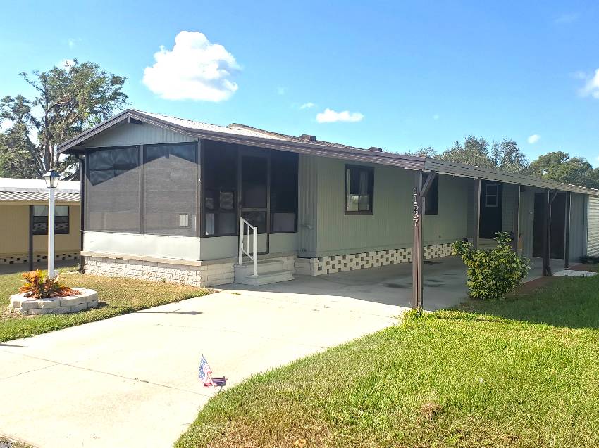 Dade City, FL Mobile Home for Sale located at 11537 Pierview Rd Fishermans Cove