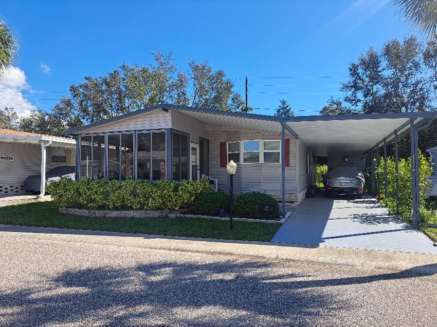 Tarpon Springs, FL Mobile Home for Sale located at 1174 Sparrow Lane Tarpon Glen