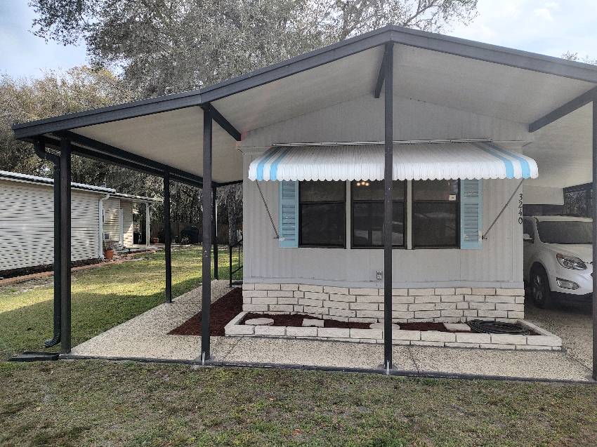 Zephyrhills, FL Mobile Home for Sale located at 3240 Blue Lagoon Dr Tropical Acre Estates