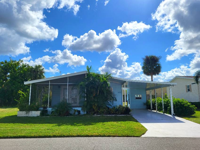 Sarasota, FL Mobile Home for Sale located at 5721 Camelford Drive Camelot Lakes Village