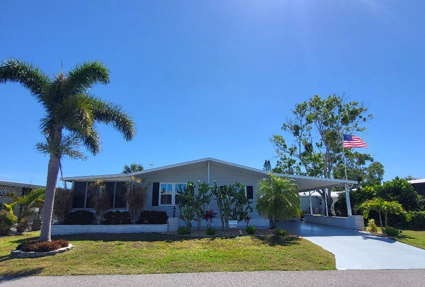 Sarasota, FL Mobile Home for Sale located at 5675 Halifax Drive Camelot Lakes Village