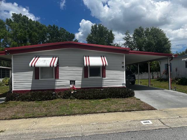 Clearwater, FL Mobile Home for Sale located at 15666 49th Street N #1002 Shady Lane Village