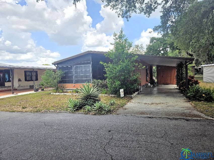 Zephyrhills, FL Mobile Home for Sale located at 37627 Oak Ridge Lane Tropical Acre Estates