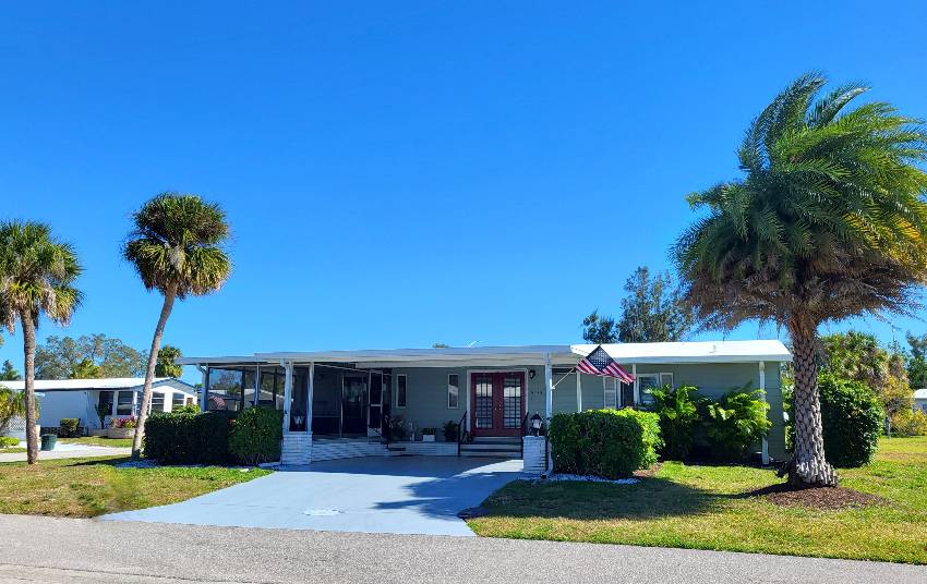 Sarasota, FL Mobile Home for Sale located at 5635 Camelford Drive Camelot Lakes Village
