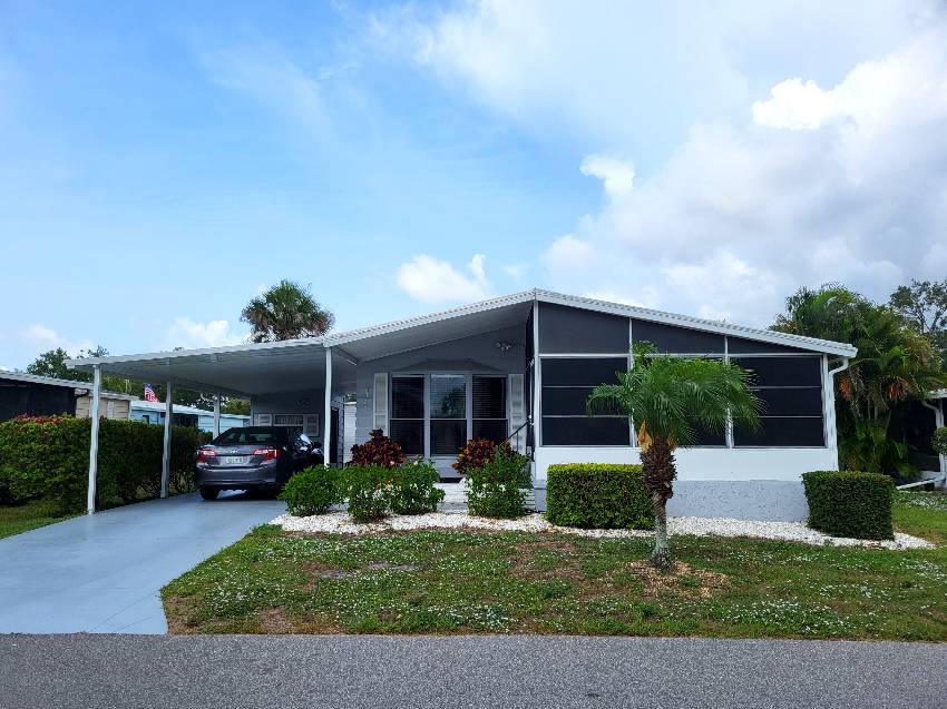 Sarasota, FL Mobile Home for Sale located at 5330 Sudbury Place Camelot Lakes Village