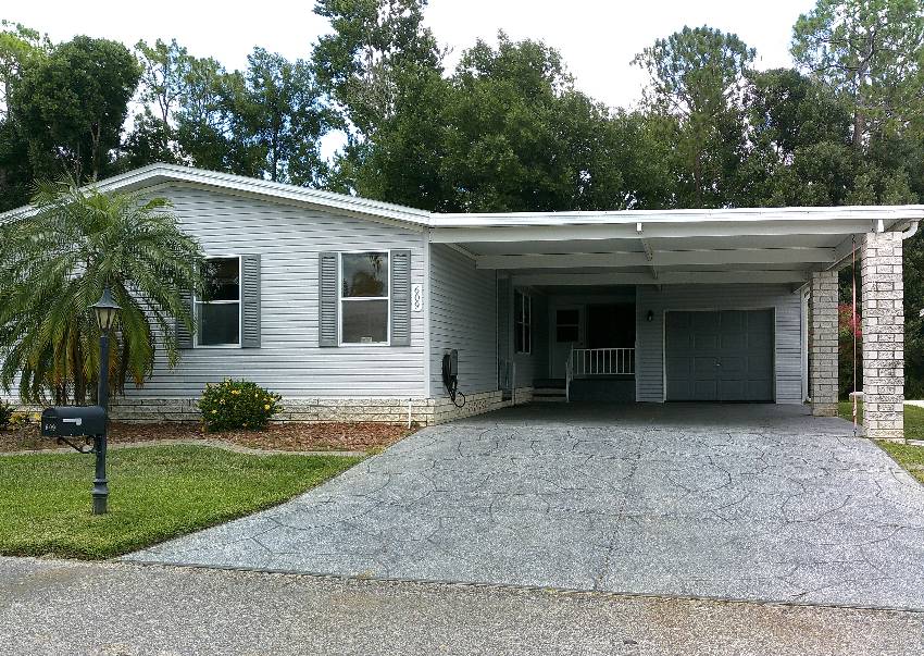 Auburndale, FL Mobile Home for Sale located at 609 Tulip Circle The Hamptons Golf & Country Club