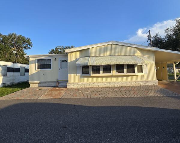 Zephyrhills, FL Mobile Home for Sale located at 4846 Rollins Street Bedrock Winters 55 Mobile Home Park