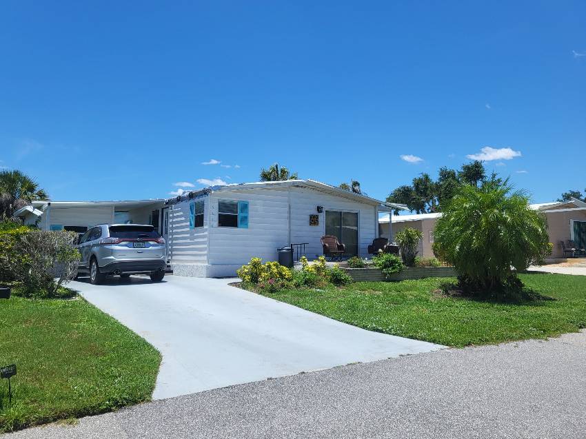 Sarasota, FL Mobile Home for Sale located at 5616 Halifax Dr Camelot Lakes Village