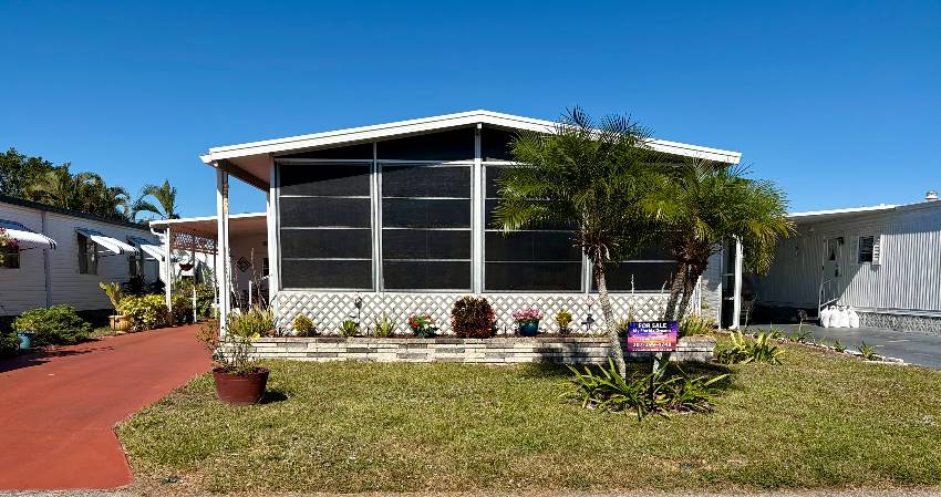 Venice, FL Mobile Home for Sale located at 977 Sand Cay E Bay Indies