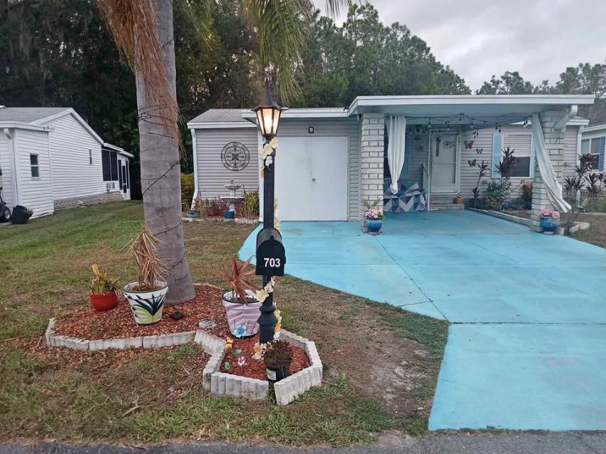 Auburndale, FL Mobile Home for Sale located at 703 Royal Forest Drive The Hamptons Golf & Country Club