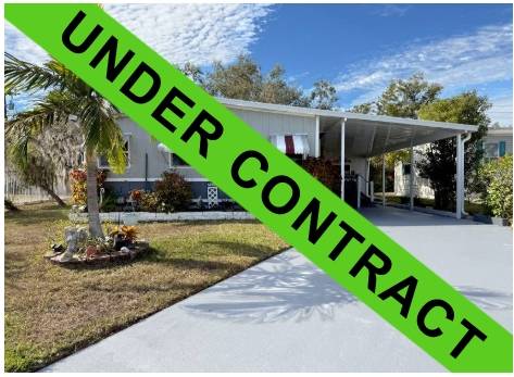 Ellenton, FL Mobile Home for Sale located at 7204 Lakeshore Dr Colony Cove