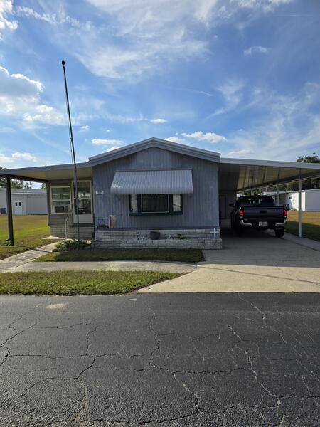 Dade City, FL Mobile Home for Sale located at 11125 Mockingbird Lane Harmony Heights Community