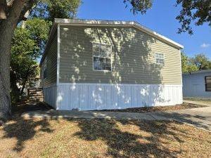 Tampa, FL Mobile Home for Sale located at 13618 N Florida Ave. Tyrone Village