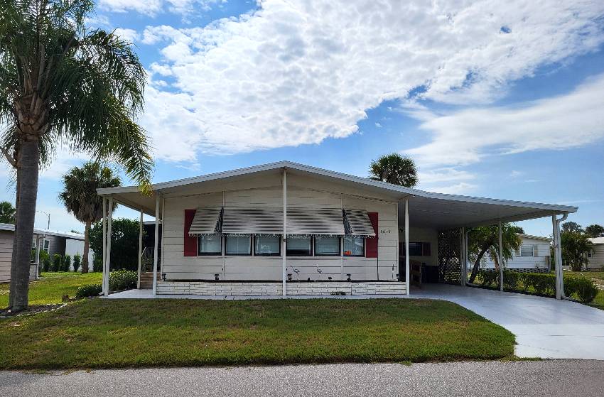 Sarasota, FL Mobile Home for Sale located at 5635 Halifax Dr Camelot Lakes Village