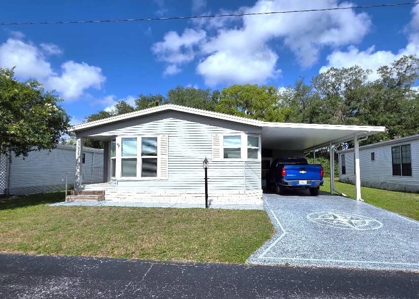 Dade City, FL Mobile Home for Sale located at 11625 Pierview Rd Fishermans Cove
