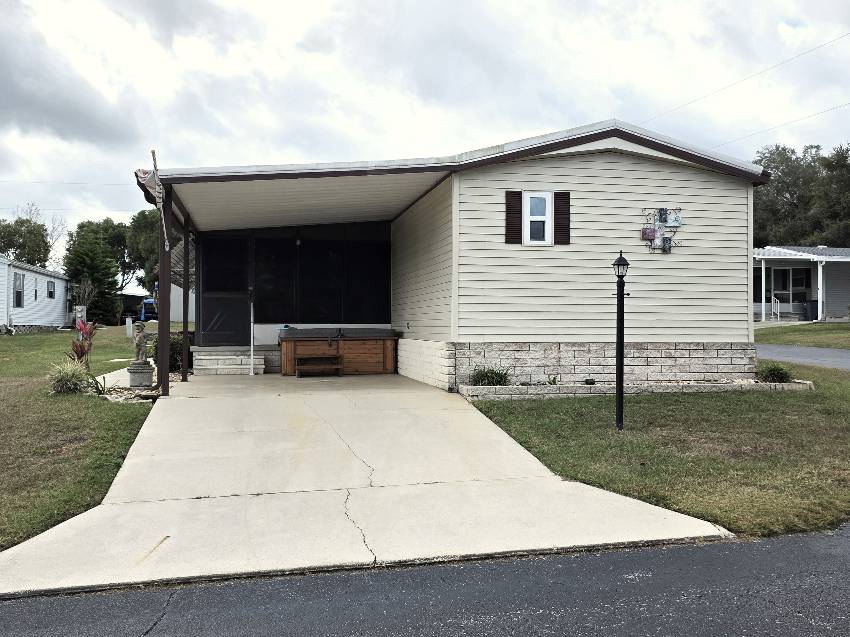 Dade City, FL Mobile Home for Sale located at 36106 Bass Dr Fishermans Cove