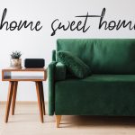 Mobile home living room with green couch