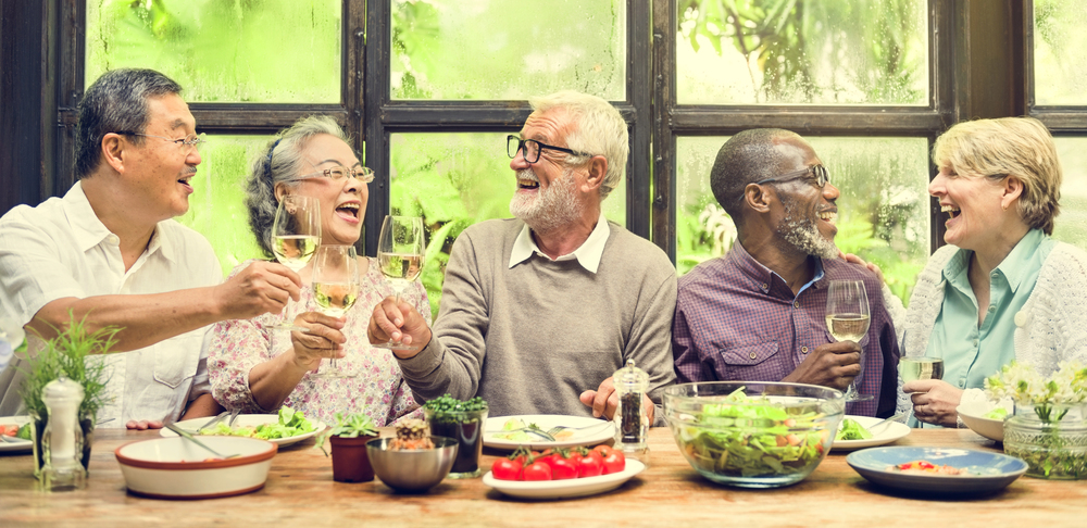 Friends at table in a mobile home community