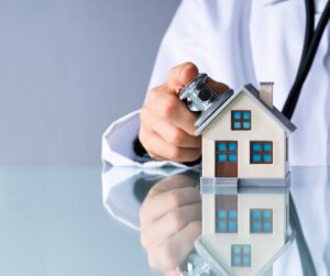 doctor with a stethoscope inspecting a home