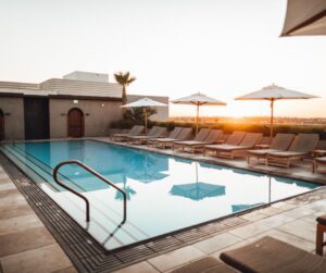 pool with chairs