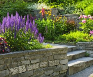 retaining wall with flowers and steps