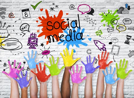 Social media sign with colorful hands