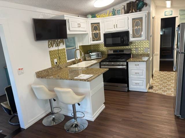 6735 Hammock Dr #111 a Port Richey, FL Mobile or Manufactured Home for Sale